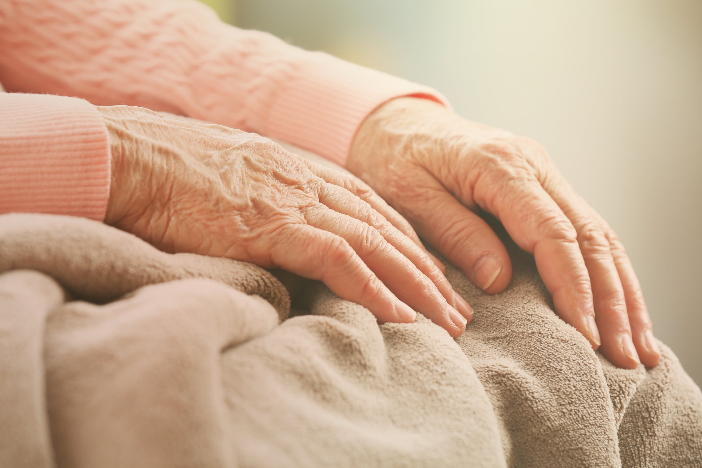 Elderly Woman's Hands, Care for the Elderly Concept